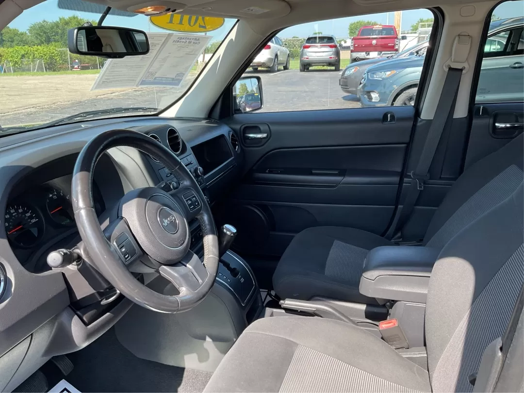 2011 Jeep Patriot Sport (1J4NT1GA1BD) with an Other engine, located at 401 Woodman Dr, Riverside, OH, 45431, (937) 908-9800, 39.760899, -84.123421 - **Adventure Awaits: Discover Your Next Journey with the 2011 Jeep Patriot Sport!**<br /> <br /> Are you ready for your next adventure? Whether you're tackling the daily commute, heading out for a weekend getaway, or simply navigating the bustling streets of Fairborn, OH, the 2011 Jeep Patriot Sport - Photo#9