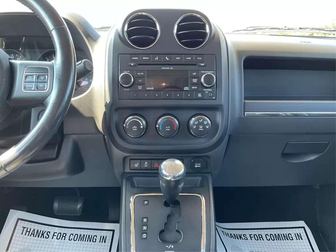 2011 Jeep Patriot Sport (1J4NT1GA1BD) with an Other engine, located at 401 Woodman Dr, Riverside, OH, 45431, (937) 908-9800, 39.760899, -84.123421 - **Adventure Awaits: Discover Your Next Journey with the 2011 Jeep Patriot Sport!**<br /> <br /> Are you ready for your next adventure? Whether you're tackling the daily commute, heading out for a weekend getaway, or simply navigating the bustling streets of Fairborn, OH, the 2011 Jeep Patriot Sport - Photo#12