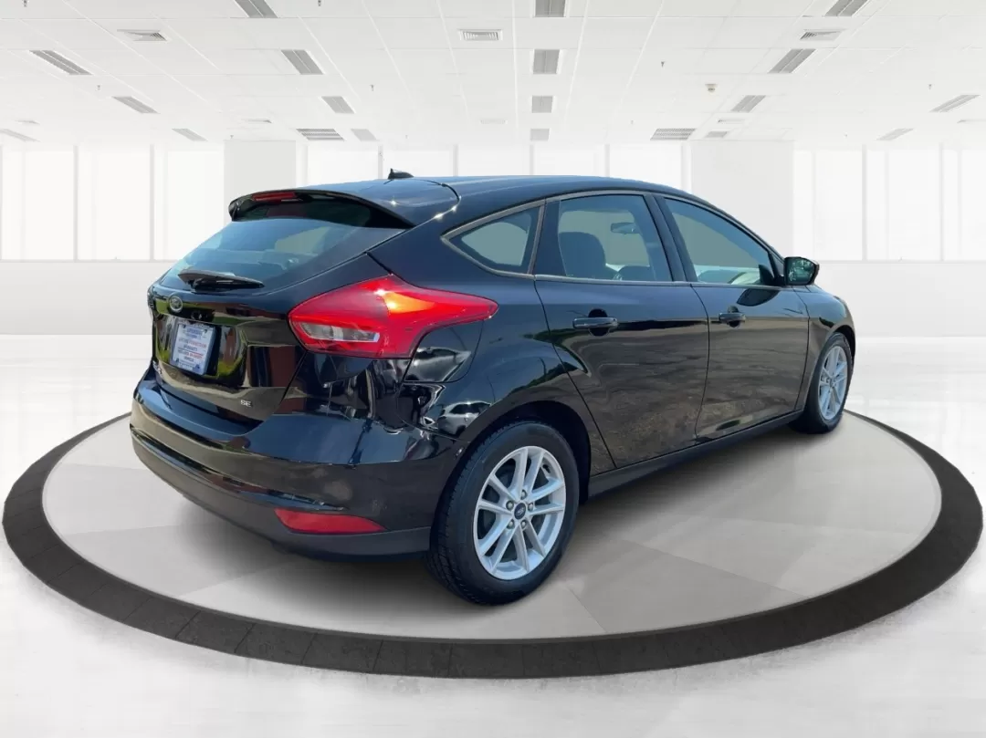 2017 Ford Focus SE (1FADP3K27HL) with an 2L I-4 gasoline direct injection engine, located at 1951 S Dayton Lakeview Rd., New Carlisle, OH, 45344, (937) 908-9800, 39.890999, -84.050255 - **Drive Your Adventure with the 2017 Ford Focus SE Hatchback!** <br /> <br /> Are you in search of a versatile vehicle that can seamlessly transition from daily commutes to weekend adventures? Look no further than this stunning 2017 Ford Focus SE Hatchback available at Advantage Car and Credit in Fa - Photo#2