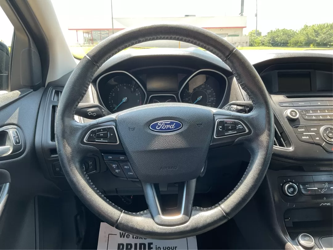2017 Ford Focus SE (1FADP3K27HL) with an 2L I-4 gasoline direct injection engine, located at 1951 S Dayton Lakeview Rd., New Carlisle, OH, 45344, (937) 908-9800, 39.890999, -84.050255 - **Drive Your Adventure with the 2017 Ford Focus SE Hatchback!** <br /> <br /> Are you in search of a versatile vehicle that can seamlessly transition from daily commutes to weekend adventures? Look no further than this stunning 2017 Ford Focus SE Hatchback available at Advantage Car and Credit in Fa - Photo#16