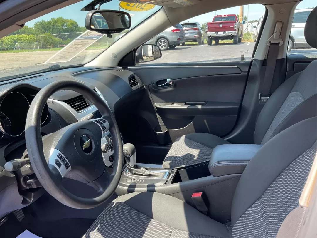 2012 Chevrolet Malibu 1LT (1G1ZC5E0XCF) with an Ecotec 2.4L I-4 DOHC engine, located at 1951 S Dayton Lakeview Rd., New Carlisle, OH, 45344, (937) 908-9800, 39.890999, -84.050255 - **Discover Your Next Adventure with This 2012 Chevrolet Malibu!** <br /> <br /> Are you searching for the perfect vehicle to elevate your daily commute or family journey? Look no further! The 2012 Chevrolet Malibu 1LT is not just a car; it's a lifestyle enhancer, designed for those who value reliabi - Photo#9