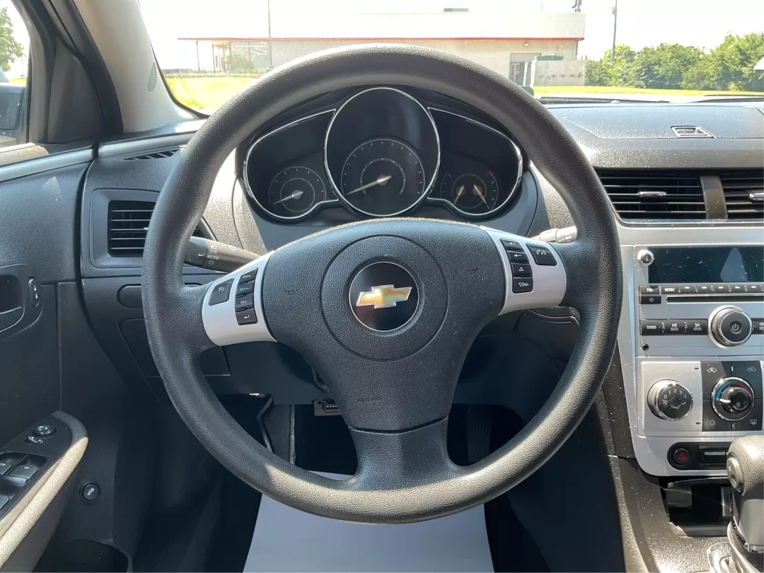 2012 Chevrolet Malibu 1LT (1G1ZC5E0XCF) with an Ecotec 2.4L I-4 DOHC engine, located at 1951 S Dayton Lakeview Rd., New Carlisle, OH, 45344, (937) 908-9800, 39.890999, -84.050255 - **Discover Your Next Adventure with This 2012 Chevrolet Malibu!** <br /> <br /> Are you searching for the perfect vehicle to elevate your daily commute or family journey? Look no further! The 2012 Chevrolet Malibu 1LT is not just a car; it's a lifestyle enhancer, designed for those who value reliabi - Photo#16