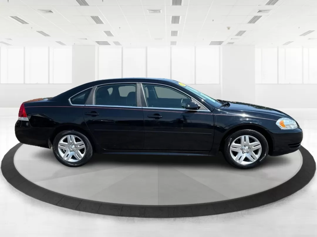 2014 Chevrolet Impala Limited LT (2G1WB5E3XE1) with an 3.6L V-6 gasoline direct injection engine, located at 1951 S Dayton Lakeview Rd., New Carlisle, OH, 45344, (937) 908-9800, 39.890999, -84.050255 - Are you ready for your next adventure, whether it's a family road trip, a daily commute, or simply running errands around Fairborn? The 2014 Chevrolet Impala Limited LT is the perfect sedan to elevate your driving experience. With its stylish black exterior and reliable performance, this vehicle is - Photo#1