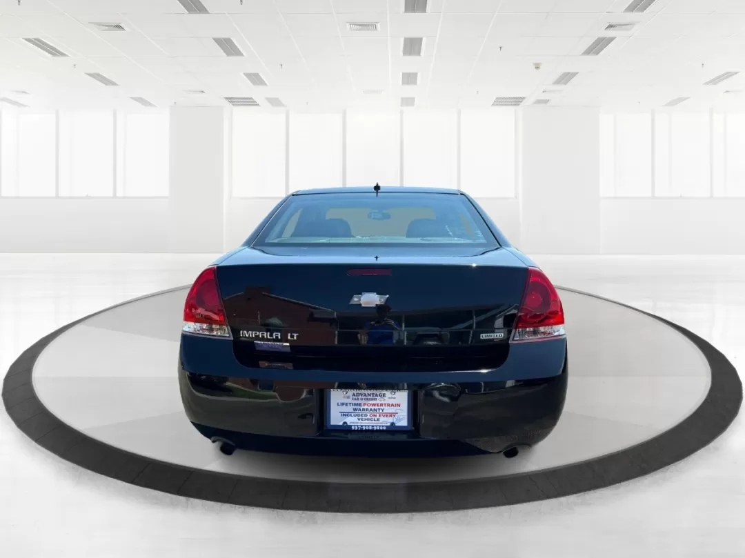 2014 Chevrolet Impala Limited LT (2G1WB5E3XE1) with an 3.6L V-6 gasoline direct injection engine, located at 1951 S Dayton Lakeview Rd., New Carlisle, OH, 45344, (937) 908-9800, 39.890999, -84.050255 - Are you ready for your next adventure, whether it's a family road trip, a daily commute, or simply running errands around Fairborn? The 2014 Chevrolet Impala Limited LT is the perfect sedan to elevate your driving experience. With its stylish black exterior and reliable performance, this vehicle is - Photo#3
