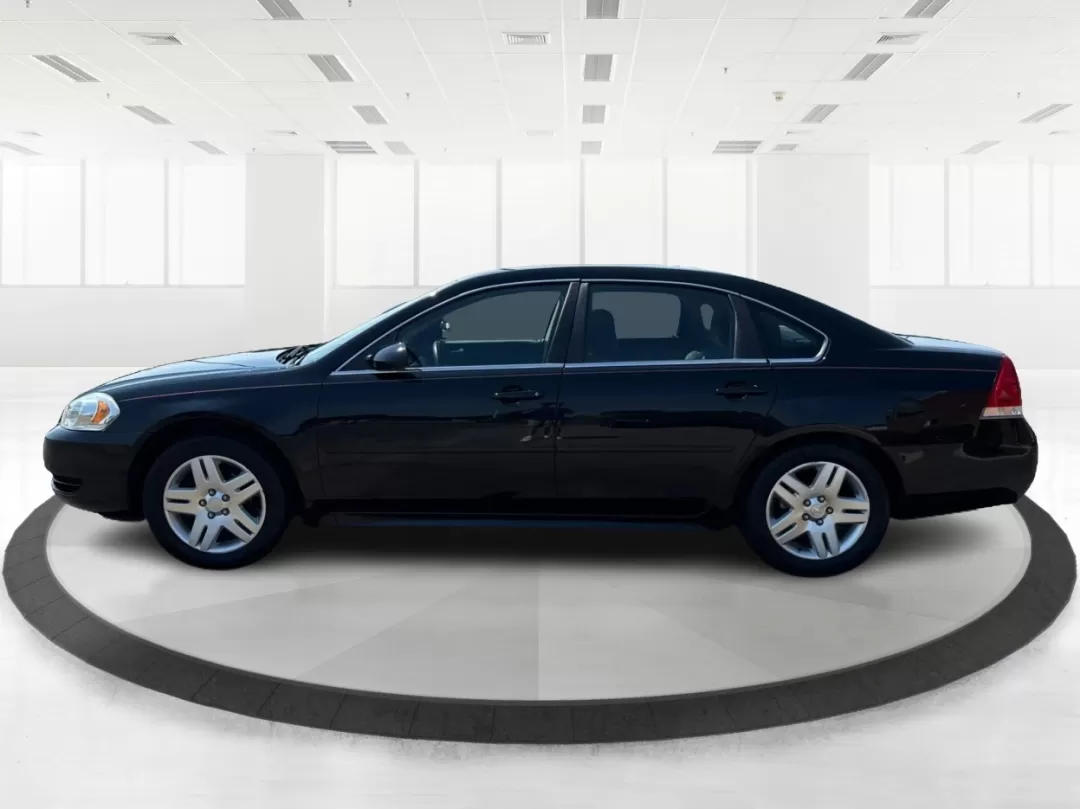 2014 Chevrolet Impala Limited LT (2G1WB5E3XE1) with an 3.6L V-6 gasoline direct injection engine, located at 1951 S Dayton Lakeview Rd., New Carlisle, OH, 45344, (937) 908-9800, 39.890999, -84.050255 - Are you ready for your next adventure, whether it's a family road trip, a daily commute, or simply running errands around Fairborn? The 2014 Chevrolet Impala Limited LT is the perfect sedan to elevate your driving experience. With its stylish black exterior and reliable performance, this vehicle is - Photo#5