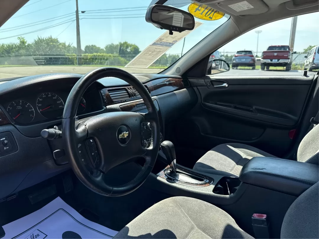2014 Chevrolet Impala Limited LT (2G1WB5E3XE1) with an 3.6L V-6 gasoline direct injection engine, located at 1951 S Dayton Lakeview Rd., New Carlisle, OH, 45344, (937) 908-9800, 39.890999, -84.050255 - Are you ready for your next adventure, whether it's a family road trip, a daily commute, or simply running errands around Fairborn? The 2014 Chevrolet Impala Limited LT is the perfect sedan to elevate your driving experience. With its stylish black exterior and reliable performance, this vehicle is - Photo#9