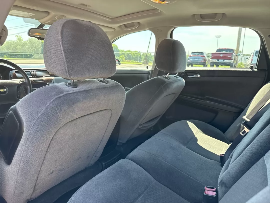 2014 Chevrolet Impala Limited LT (2G1WB5E3XE1) with an 3.6L V-6 gasoline direct injection engine, located at 1951 S Dayton Lakeview Rd., New Carlisle, OH, 45344, (937) 908-9800, 39.890999, -84.050255 - Are you ready for your next adventure, whether it's a family road trip, a daily commute, or simply running errands around Fairborn? The 2014 Chevrolet Impala Limited LT is the perfect sedan to elevate your driving experience. With its stylish black exterior and reliable performance, this vehicle is - Photo#10
