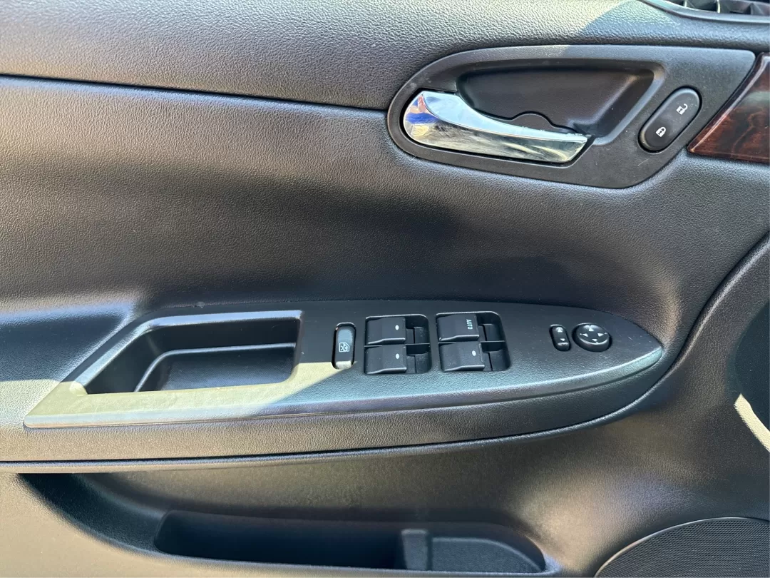 2014 Chevrolet Impala Limited LT (2G1WB5E3XE1) with an 3.6L V-6 gasoline direct injection engine, located at 1951 S Dayton Lakeview Rd., New Carlisle, OH, 45344, (937) 908-9800, 39.890999, -84.050255 - Are you ready for your next adventure, whether it's a family road trip, a daily commute, or simply running errands around Fairborn? The 2014 Chevrolet Impala Limited LT is the perfect sedan to elevate your driving experience. With its stylish black exterior and reliable performance, this vehicle is - Photo#19