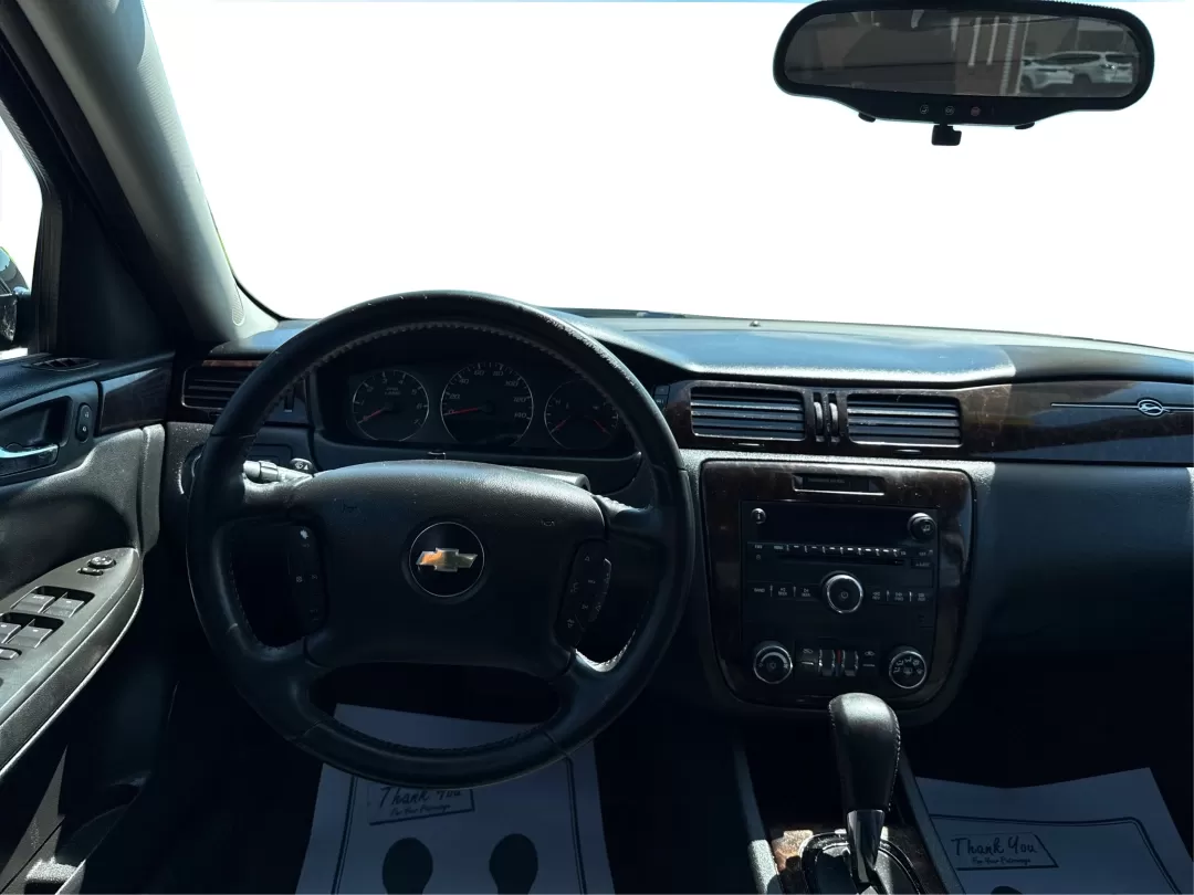 2014 Chevrolet Impala Limited LT (2G1WB5E3XE1) with an 3.6L V-6 gasoline direct injection engine, located at 1951 S Dayton Lakeview Rd., New Carlisle, OH, 45344, (937) 908-9800, 39.890999, -84.050255 - Are you ready for your next adventure, whether it's a family road trip, a daily commute, or simply running errands around Fairborn? The 2014 Chevrolet Impala Limited LT is the perfect sedan to elevate your driving experience. With its stylish black exterior and reliable performance, this vehicle is - Photo#21