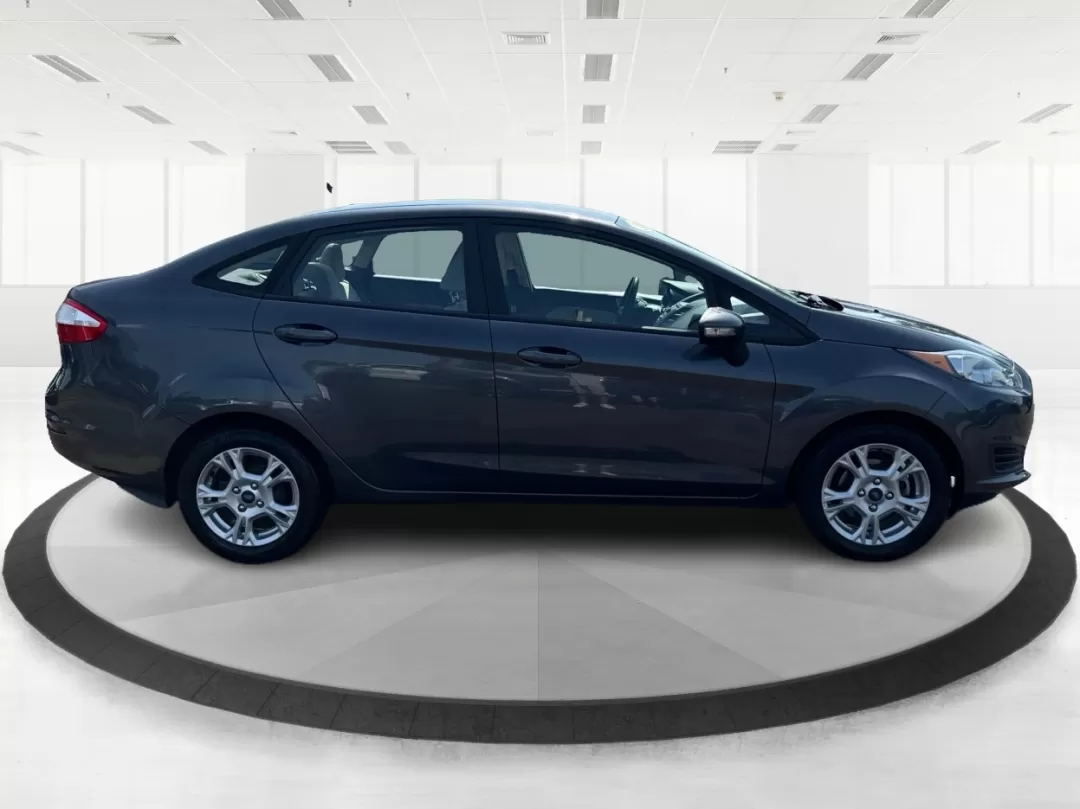 2015 Ford Fiesta SE (3FADP4BJ4FM) with an EcoBoost 1L I-3 gasoline direct injection engine, located at 8750 N County Rd 25A, Piqua, OH, 45356, (937) 908-9800, 40.164391, -84.232513 - Photo#1