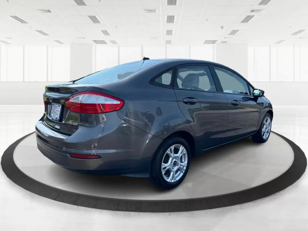 2015 Ford Fiesta SE (3FADP4BJ4FM) with an EcoBoost 1L I-3 gasoline direct injection engine, located at 8750 N County Rd 25A, Piqua, OH, 45356, (937) 908-9800, 40.164391, -84.232513 - Photo#2
