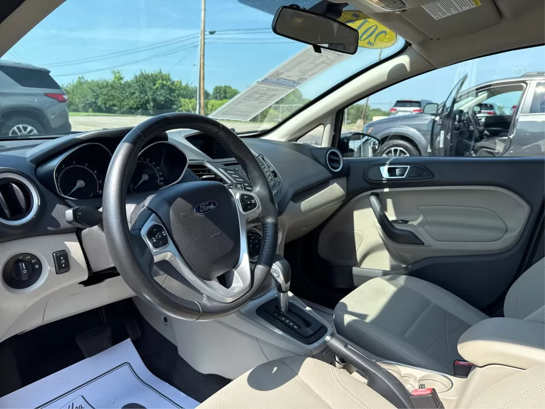 2015 Ford Fiesta SE (3FADP4BJ4FM) with an EcoBoost 1L I-3 gasoline direct injection engine, located at 8750 N County Rd 25A, Piqua, OH, 45356, (937) 908-9800, 40.164391, -84.232513 - Photo#9