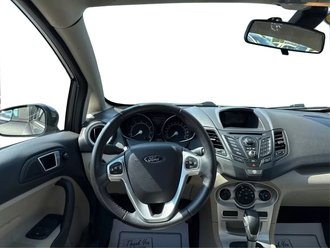 2015 Ford Fiesta SE (3FADP4BJ4FM) with an EcoBoost 1L I-3 gasoline direct injection engine, located at 8750 N County Rd 25A, Piqua, OH, 45356, (937) 908-9800, 40.164391, -84.232513 - Photo#21