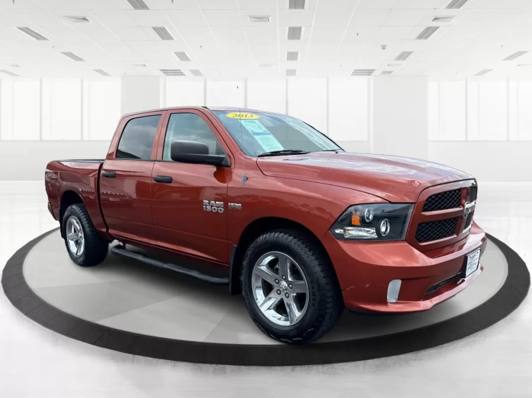 2013 Ram 1500 Express (1C6RR7KT8DS) with an HEMI 5.7L V-8 variable valve control engine, located at 8750 N County Rd 25A, Piqua, OH, 45356, (937) 908-9800, 40.164391, -84.232513 - **Adventure Awaits: Discover the 2013 Ram 1500 at Advantage Car and Credit!**<br /> <br /> If you're looking for a versatile and powerful truck that can seamlessly transition from weekday commutes to weekend adventures, look no further than this stunning 2013 Ram 1500 Express. With its bold Copperhe - Photo#0