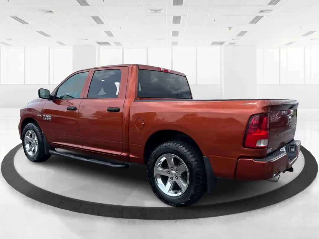 2013 Ram 1500 Express (1C6RR7KT8DS) with an HEMI 5.7L V-8 variable valve control engine, located at 8750 N County Rd 25A, Piqua, OH, 45356, (937) 908-9800, 40.164391, -84.232513 - **Adventure Awaits: Discover the 2013 Ram 1500 at Advantage Car and Credit!**<br /> <br /> If you're looking for a versatile and powerful truck that can seamlessly transition from weekday commutes to weekend adventures, look no further than this stunning 2013 Ram 1500 Express. With its bold Copperhe - Photo#4