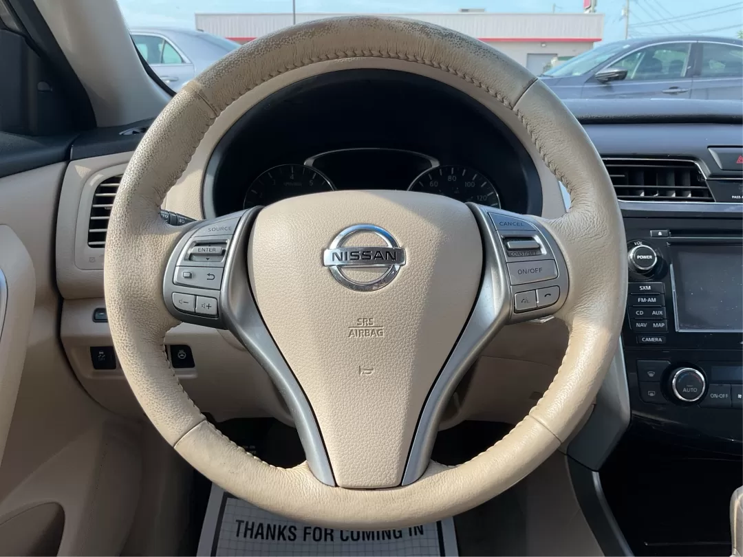 2014 Nissan Altima 2.5 SL (1N4AL3AP7EC) with an 2.5L I-4 DOHC engine, located at 4508 South Dixie Dr, Moraine, OH, 45439, (937) 908-9800, 39.689976, -84.218452 - Experience the perfect blend of comfort and reliability with the 2014 Nissan Altima 2.5 SL, available at Advantage Car and Credit in Fairborn, OH. This sedan is not just a means of transportation; it's a lifestyle choice for those who value efficiency and style, making it ideal for long commutes or - Photo#16
