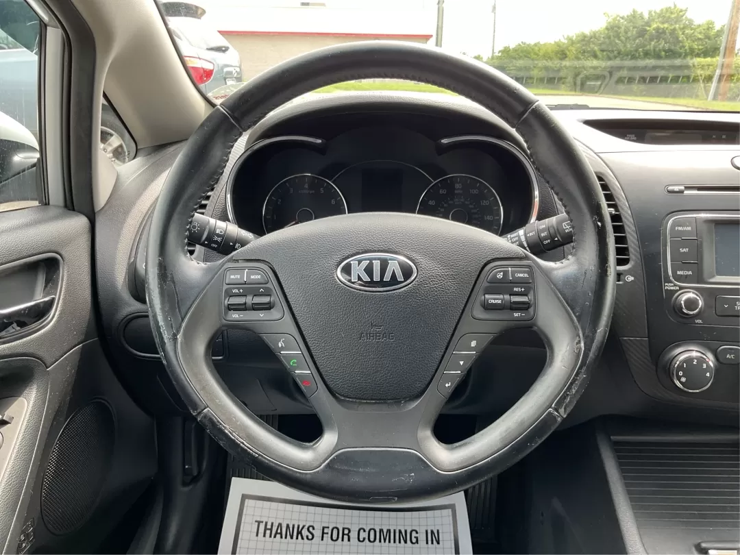 2014 Kia Forte EX (KNAFX5A88E5) with an 2L I-4 gasoline direct injection engine, located at 401 Woodman Dr, Riverside, OH, 45431, (937) 908-9800, 39.760899, -84.123421 - **Discover Your Next Adventure with the 2014 Kia Forte EX at Advantage Car and Credit!**<br /> <br /> Are you ready to elevate your daily commute or embark on weekend adventures? The 2014 Kia Forte EX is the perfect companion, whether you're navigating the bustling streets of Fairborn, OH, or hittin - Photo#16