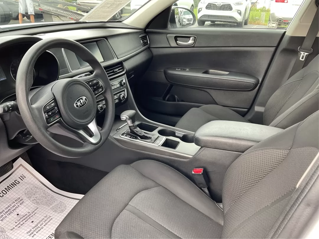 2018 Kia Optima LX (5XXGT4L35JG) with an Theta II 2.4L I-4 gasoline direct injection engine, located at 1951 S Dayton Lakeview Rd., New Carlisle, OH, 45344, (937) 908-9800, 39.890999, -84.050255 - Discover the perfect blend of style, safety, and affordability with this stunning 2018 Kia Optima LX, available now at Advantage Car and Credit in Fairborn, OH. This sedan is not just a car; it's your companion for all of life's adventures. Whether you're commuting to work, shuttling the kids to sch - Photo#9