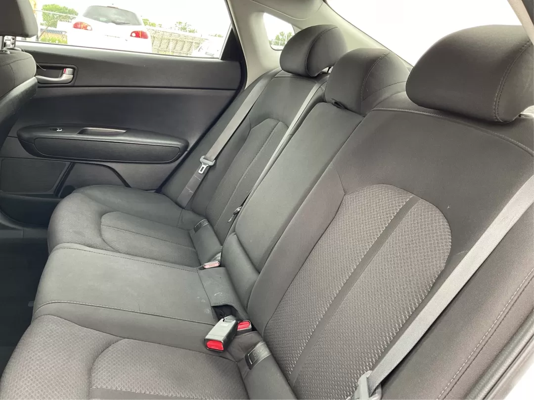 2018 Kia Optima LX (5XXGT4L35JG) with an Theta II 2.4L I-4 gasoline direct injection engine, located at 1951 S Dayton Lakeview Rd., New Carlisle, OH, 45344, (937) 908-9800, 39.890999, -84.050255 - Discover the perfect blend of style, safety, and affordability with this stunning 2018 Kia Optima LX, available now at Advantage Car and Credit in Fairborn, OH. This sedan is not just a car; it's your companion for all of life's adventures. Whether you're commuting to work, shuttling the kids to sch - Photo#10
