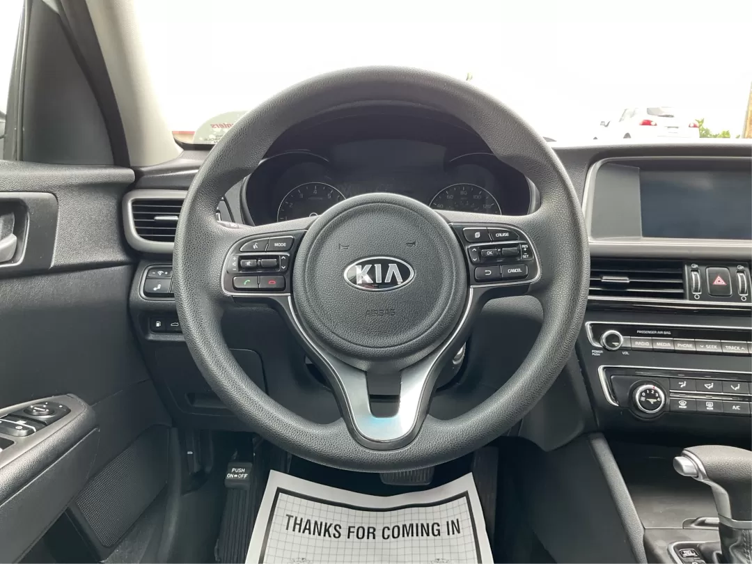 2018 Kia Optima LX (5XXGT4L35JG) with an Theta II 2.4L I-4 gasoline direct injection engine, located at 1951 S Dayton Lakeview Rd., New Carlisle, OH, 45344, (937) 908-9800, 39.890999, -84.050255 - Discover the perfect blend of style, safety, and affordability with this stunning 2018 Kia Optima LX, available now at Advantage Car and Credit in Fairborn, OH. This sedan is not just a car; it's your companion for all of life's adventures. Whether you're commuting to work, shuttling the kids to sch - Photo#16