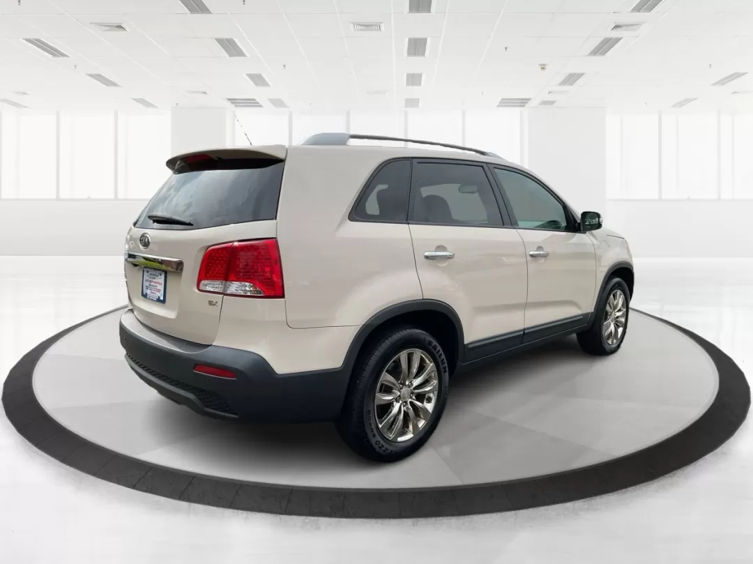 2011 Kia Sorento EX (5XYKU4A11BG) with an 2.4L I-4 DOHC engine, located at 880 E. National Road, Vandalia, OH, 45377, (937) 908-9800, 39.891918, -84.183594 - Are you ready to elevate your family's adventures while keeping comfort and safety at the forefront? Look no further than this 2011 Kia Sorento EX, available now at Advantage Car and Credit, your trusted Buy Here Pay Here dealership located at 1184 Kauffman Ave, Fairborn, OH 45324. With guaranteed a - Photo#2
