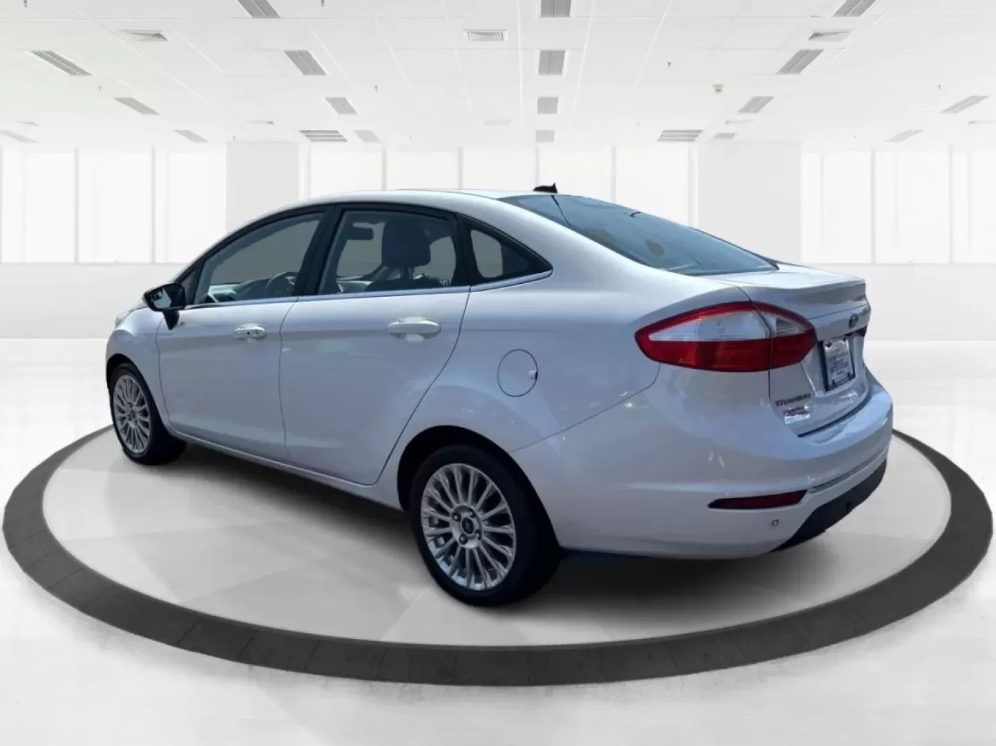 2016 Ford Fiesta Titanium (3FADP4CJ9GM) with an 1.6L I-4 DOHC engine, located at 880 E. National Road, Vandalia, OH, 45377, (937) 908-9800, 39.891918, -84.183594 - **Experience the Ultimate in Style and Comfort with the 2016 Ford Fiesta Titanium Sedan!**<br /> <br /> Are you looking for a stylish yet practical vehicle that fits seamlessly into your daily life? The 2016 Ford Fiesta Titanium Sedan is designed for those who crave sophistication without sacrificin - Photo#4