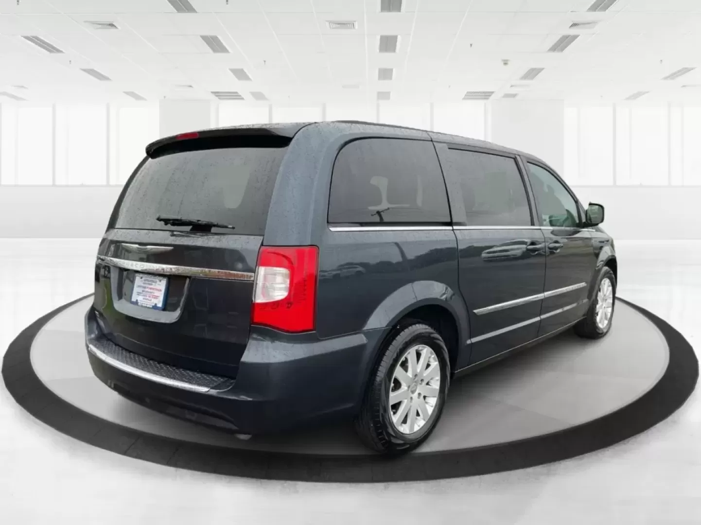 2013 Chrysler Town and Country Touring (2C4RC1BG5DR) with an Pentastar 3.6L V-6 DOHC engine, located at 8750 N County Rd 25A, Piqua, OH, 45356, (937) 908-9800, 40.164391, -84.232513 - Photo#2