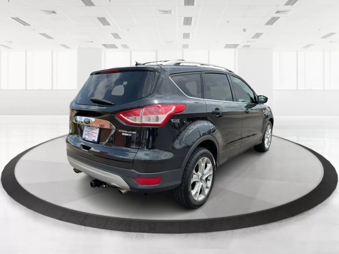 2015 Ford Escape Titanium (1FMCU9J95FU) with an Other engine, located at 1230 East Main St, Xenia, OH, 45385, (937) 908-9800, 39.688026, -83.910172 - Discover your next adventure with the 2015 Ford Escape Titanium, now available at Advantage Car and Credit in Fairborn, OH! Whether you're looking for a family-friendly SUV, a reliable commuter vehicle, or a versatile option for weekend getaways, this Escape checks all the boxes. With a stunning Tux - Photo#2