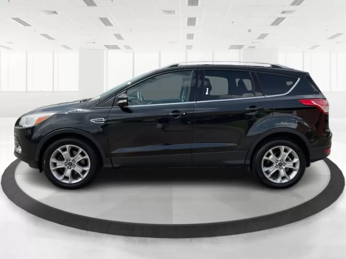 2015 Ford Escape Titanium (1FMCU9J95FU) with an Other engine, located at 1230 East Main St, Xenia, OH, 45385, (937) 908-9800, 39.688026, -83.910172 - Discover your next adventure with the 2015 Ford Escape Titanium, now available at Advantage Car and Credit in Fairborn, OH! Whether you're looking for a family-friendly SUV, a reliable commuter vehicle, or a versatile option for weekend getaways, this Escape checks all the boxes. With a stunning Tux - Photo#4