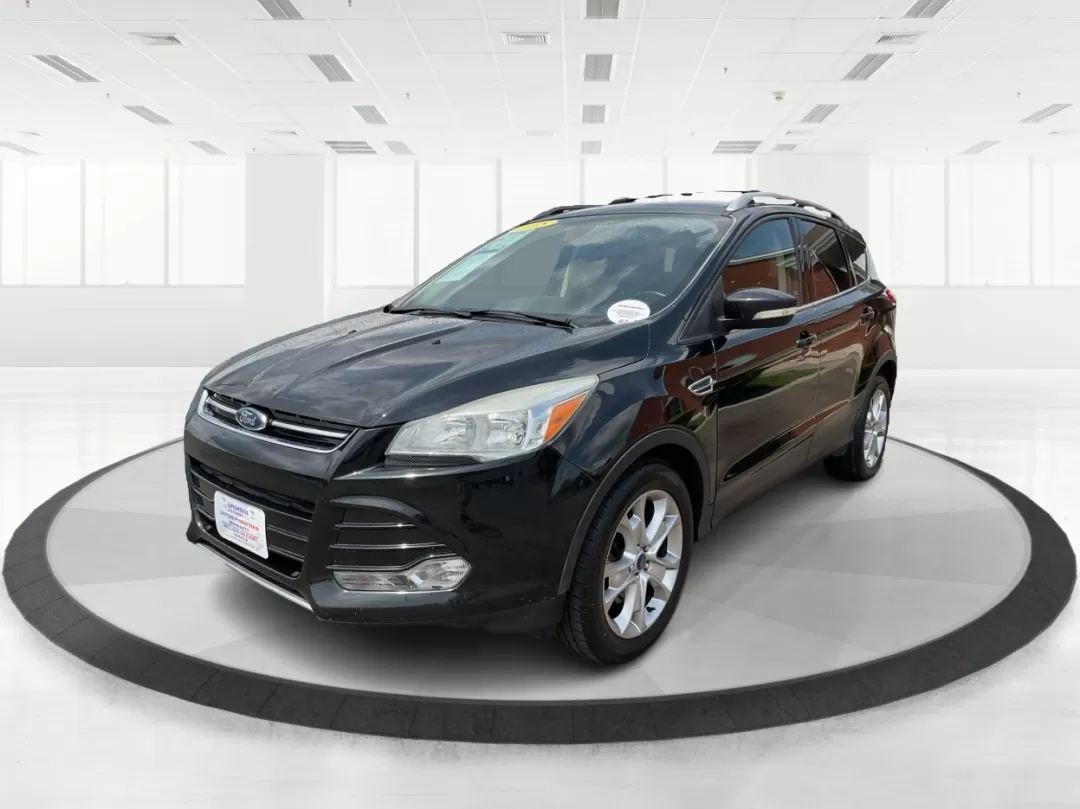 2015 Ford Escape Titanium (1FMCU9J95FU) with an Other engine, located at 1230 East Main St, Xenia, OH, 45385, (937) 908-9800, 39.688026, -83.910172 - Discover your next adventure with the 2015 Ford Escape Titanium, now available at Advantage Car and Credit in Fairborn, OH! Whether you're looking for a family-friendly SUV, a reliable commuter vehicle, or a versatile option for weekend getaways, this Escape checks all the boxes. With a stunning Tux - Photo#7