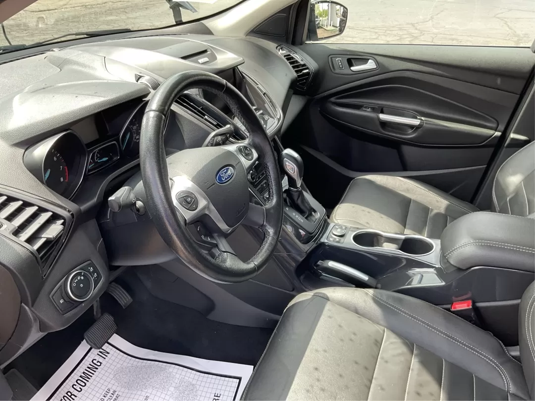 2015 Ford Escape Titanium (1FMCU9J95FU) with an Other engine, located at 1230 East Main St, Xenia, OH, 45385, (937) 908-9800, 39.688026, -83.910172 - Discover your next adventure with the 2015 Ford Escape Titanium, now available at Advantage Car and Credit in Fairborn, OH! Whether you're looking for a family-friendly SUV, a reliable commuter vehicle, or a versatile option for weekend getaways, this Escape checks all the boxes. With a stunning Tux - Photo#8