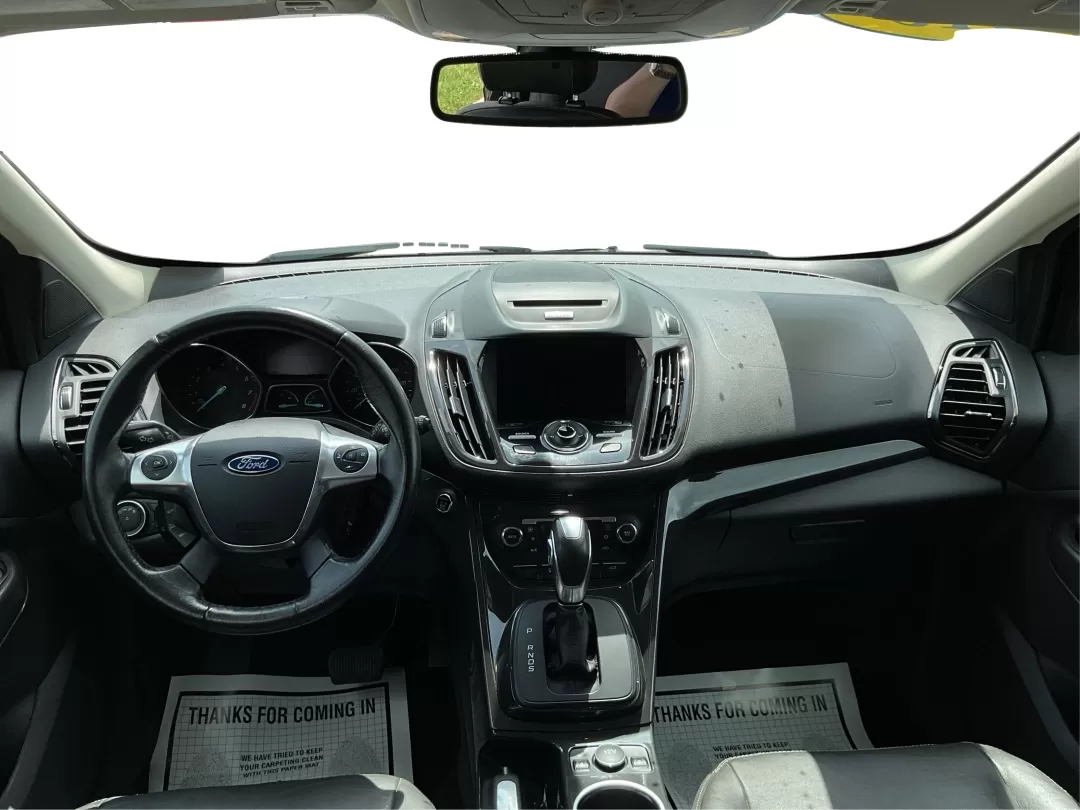 2015 Ford Escape Titanium (1FMCU9J95FU) with an Other engine, located at 1230 East Main St, Xenia, OH, 45385, (937) 908-9800, 39.688026, -83.910172 - Discover your next adventure with the 2015 Ford Escape Titanium, now available at Advantage Car and Credit in Fairborn, OH! Whether you're looking for a family-friendly SUV, a reliable commuter vehicle, or a versatile option for weekend getaways, this Escape checks all the boxes. With a stunning Tux - Photo#20