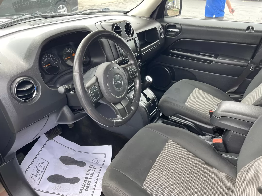2014 Jeep Patriot Latitude 4WD (1C4NJRFB5ED) with an 2.4L L4 DOHC 16V engine, located at 1230 East Main St, Xenia, OH, 45385, (937) 908-9800, 39.688026, -83.910172 - Photo#2