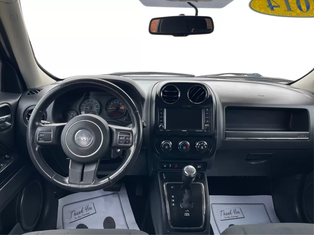 2014 Jeep Patriot Latitude 4WD (1C4NJRFB5ED) with an 2.4L L4 DOHC 16V engine, located at 1230 East Main St, Xenia, OH, 45385, (937) 908-9800, 39.688026, -83.910172 - Photo#13