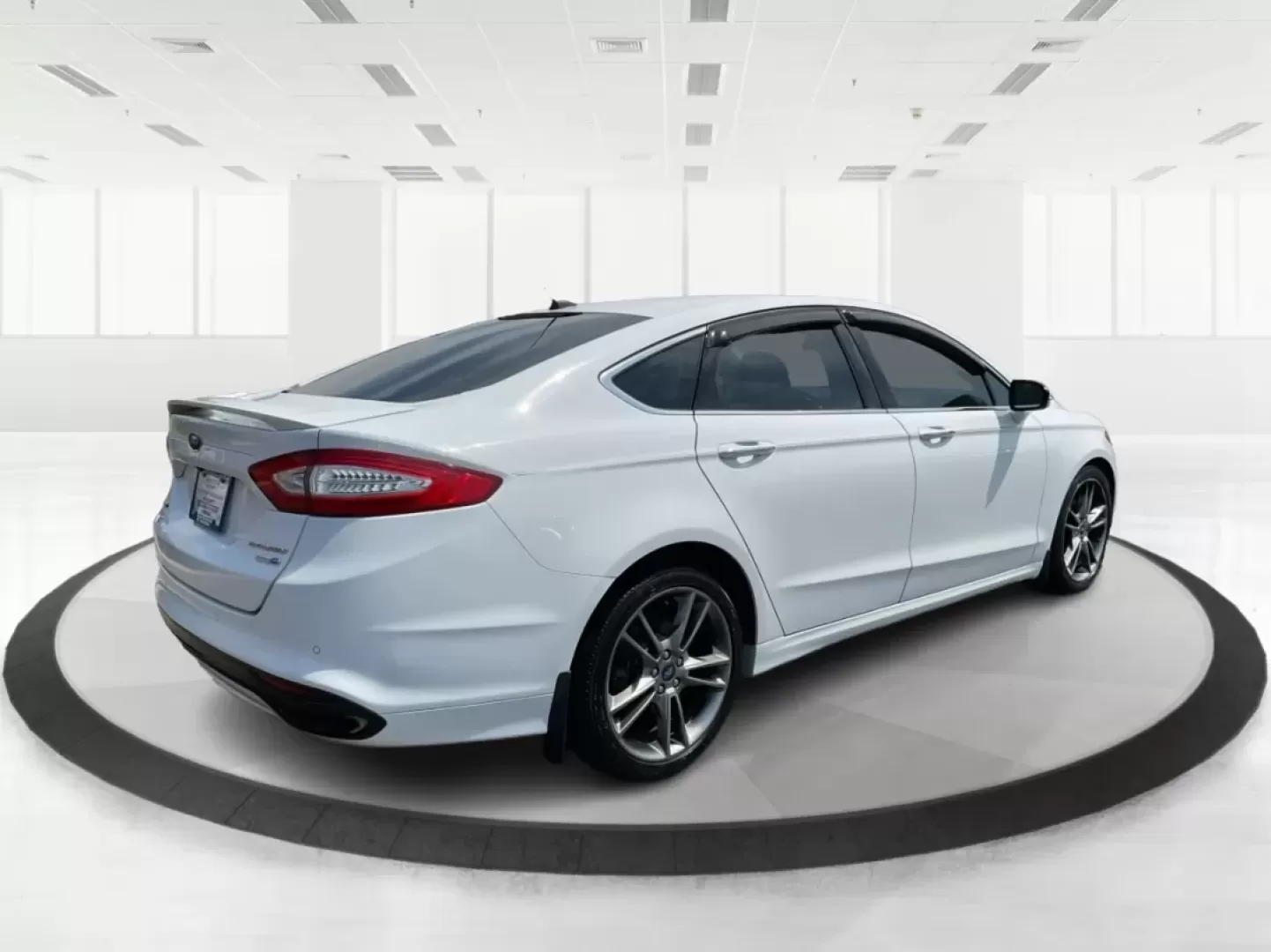 2013 Ford Fusion Titanium (3FA6P0D93DR) with an EcoBoost 2L I-4 gasoline direct injection engine, located at 1230 East Main St, Xenia, OH, 45385, (937) 908-9800, 39.688026, -83.910172 - Photo#2