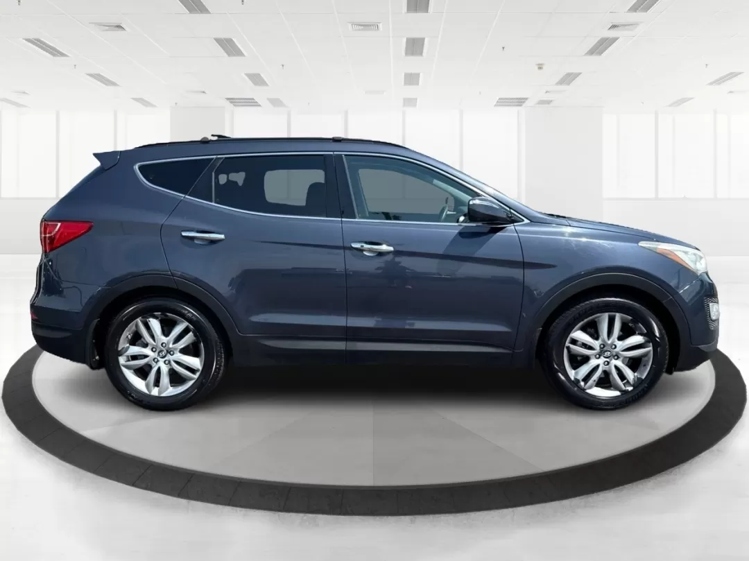2013 Hyundai Santa Fe Sport 2.0T (5XYZU3LA1DG) with an Theta II 2L I-4 gasoline direct injection engine, located at 1230 East Main St, Xenia, OH, 45385, (937) 908-9800, 39.688026, -83.910172 - Photo#1