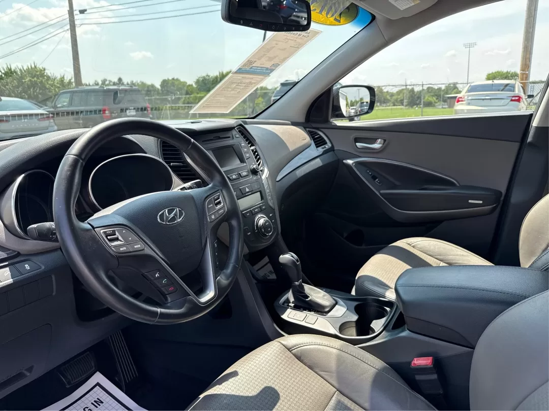 2013 Hyundai Santa Fe Sport 2.0T (5XYZU3LA1DG) with an Theta II 2L I-4 gasoline direct injection engine, located at 1230 East Main St, Xenia, OH, 45385, (937) 908-9800, 39.688026, -83.910172 - Photo#9
