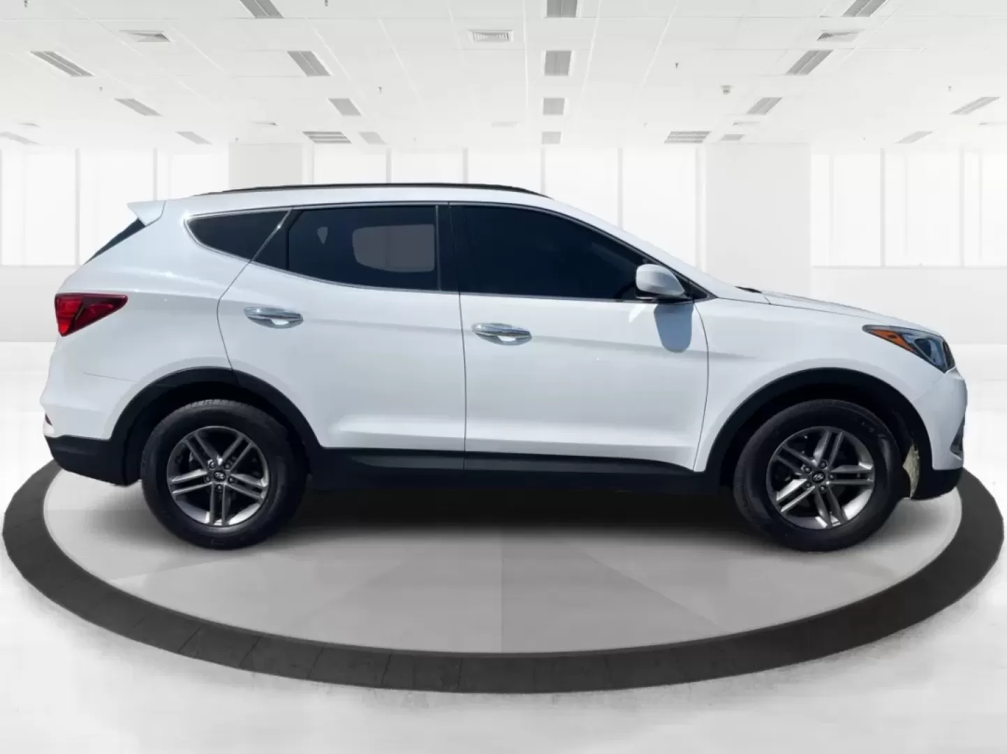 2017 Hyundai Santa Fe 2.4L (5XYZU3LB3HG) with an Theta II 2.4L I-4 gasoline direct injection engine, located at 1230 East Main St, Xenia, OH, 45385, (937) 908-9800, 39.688026, -83.910172 - Are you ready to elevate your family adventures with a premium SUV that seamlessly blends style, comfort, and reliability? Look no further than this stunning 2017 Hyundai Santa Fe, available now at Advantage Car and Credit in Fairborn, OH. Whether you're commuting to work, heading out on a family ro - Photo#1