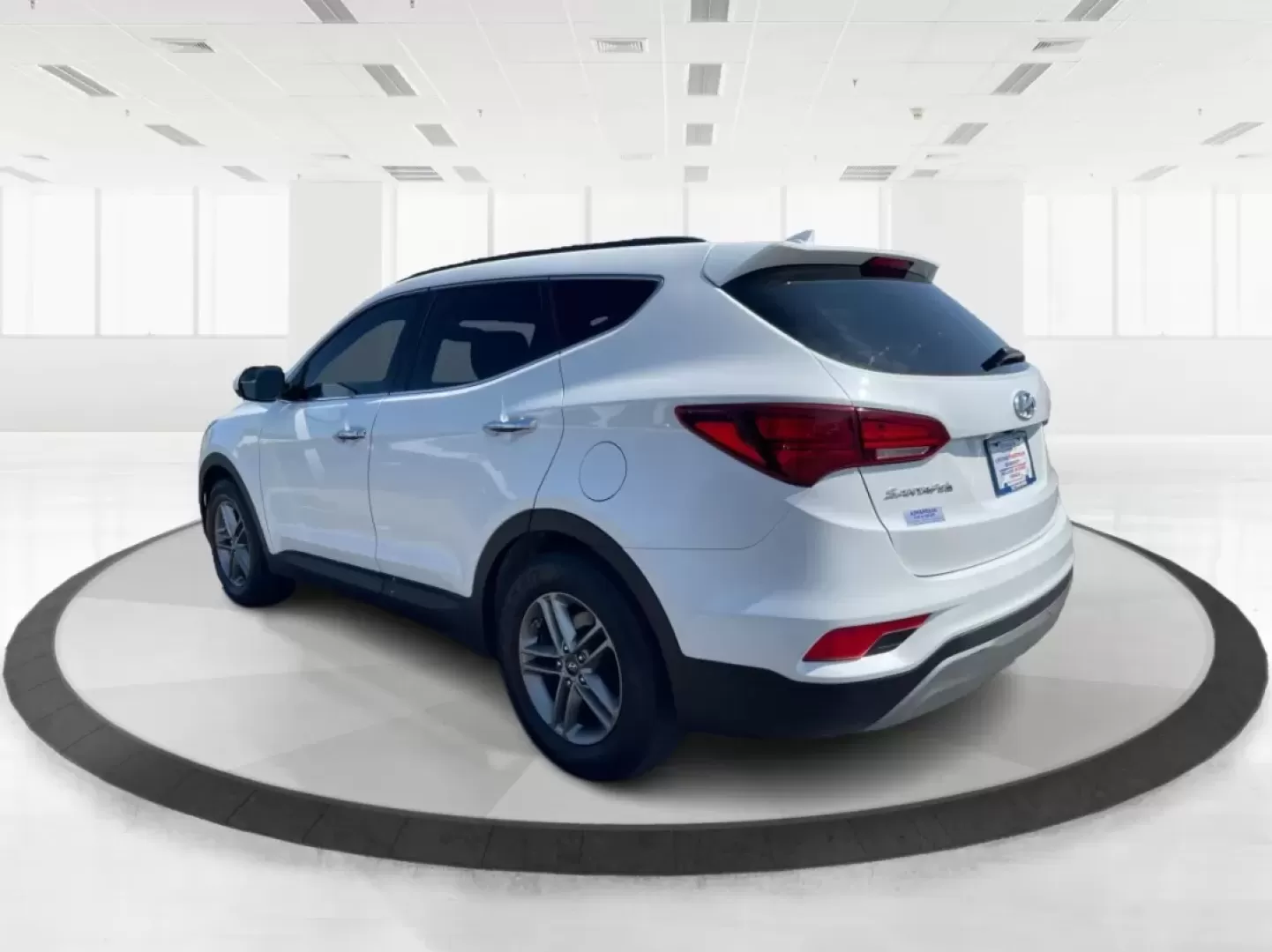 2017 Hyundai Santa Fe 2.4L (5XYZU3LB3HG) with an Theta II 2.4L I-4 gasoline direct injection engine, located at 1230 East Main St, Xenia, OH, 45385, (937) 908-9800, 39.688026, -83.910172 - Are you ready to elevate your family adventures with a premium SUV that seamlessly blends style, comfort, and reliability? Look no further than this stunning 2017 Hyundai Santa Fe, available now at Advantage Car and Credit in Fairborn, OH. Whether you're commuting to work, heading out on a family ro - Photo#4