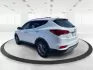 2017 Hyundai Santa Fe 2.4L (5XYZU3LB3HG) with an Theta II 2.4L I-4 gasoline direct injection engine, located at 1230 East Main St, Xenia, OH, 45385, (937) 908-9800, 39.688026, -83.910172 - Are you ready to elevate your family adventures with a premium SUV that seamlessly blends style, comfort, and reliability? Look no further than this stunning 2017 Hyundai Santa Fe, available now at Advantage Car and Credit in Fairborn, OH. Whether you're commuting to work, heading out on a family ro - Photo#4