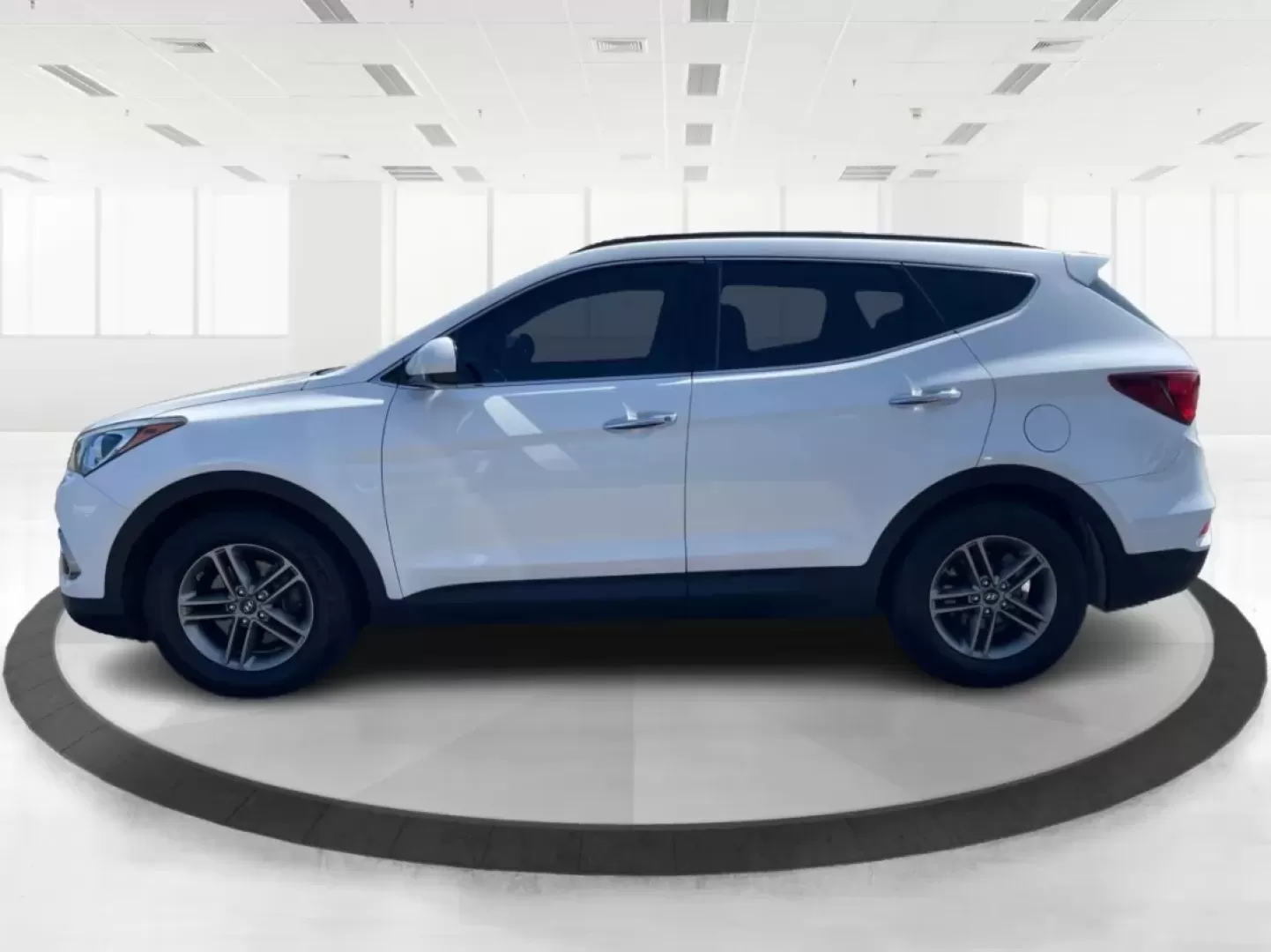 2017 Hyundai Santa Fe 2.4L (5XYZU3LB3HG) with an Theta II 2.4L I-4 gasoline direct injection engine, located at 1230 East Main St, Xenia, OH, 45385, (937) 908-9800, 39.688026, -83.910172 - Are you ready to elevate your family adventures with a premium SUV that seamlessly blends style, comfort, and reliability? Look no further than this stunning 2017 Hyundai Santa Fe, available now at Advantage Car and Credit in Fairborn, OH. Whether you're commuting to work, heading out on a family ro - Photo#5