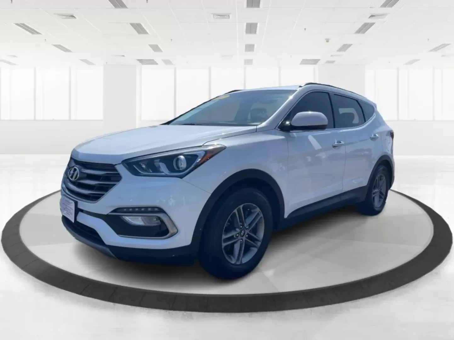 2017 Hyundai Santa Fe 2.4L (5XYZU3LB3HG) with an Theta II 2.4L I-4 gasoline direct injection engine, located at 1230 East Main St, Xenia, OH, 45385, (937) 908-9800, 39.688026, -83.910172 - Are you ready to elevate your family adventures with a premium SUV that seamlessly blends style, comfort, and reliability? Look no further than this stunning 2017 Hyundai Santa Fe, available now at Advantage Car and Credit in Fairborn, OH. Whether you're commuting to work, heading out on a family ro - Photo#8