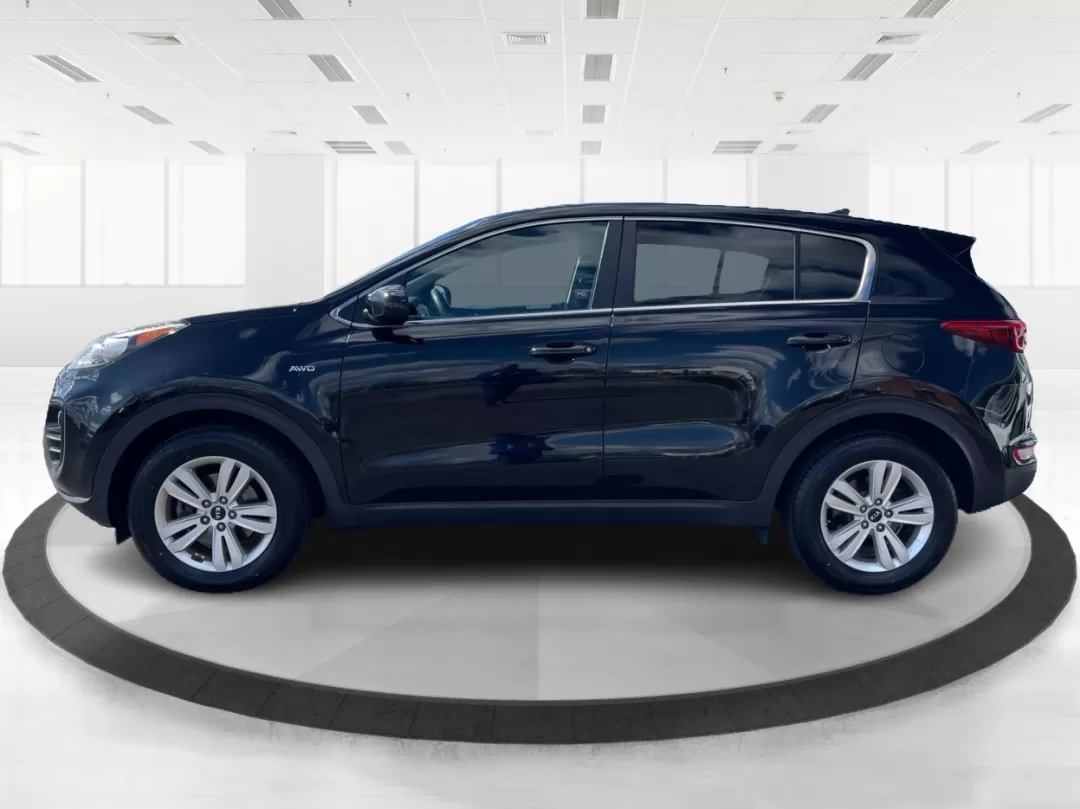 2019 Kia Sportage LX (KNDPMCACXK7) with an Theta II 2.4L I-4 gasoline direct injection engine, located at 8750 N County Rd 25A, Piqua, OH, 45356, (937) 908-9800, 40.164391, -84.232513 - Photo#5