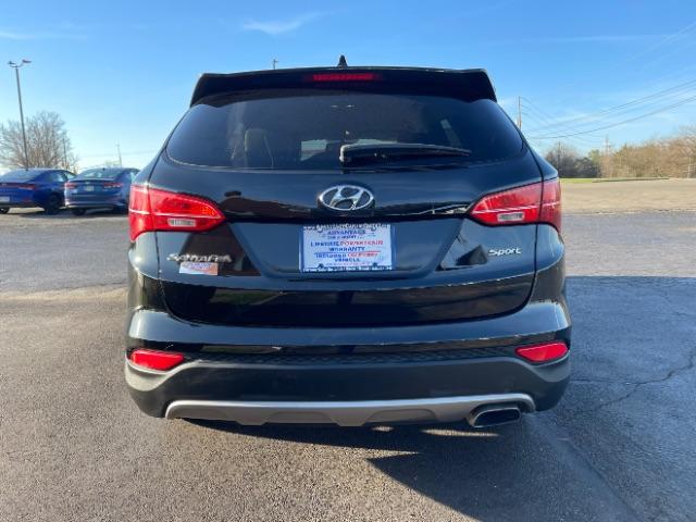 2014 Twilight Black Hyundai Santa Fe Sport 2.4 FWD (5XYZT3LB5EG) with an 2.4L L4 DOHC 16V engine, 6-Speed Automatic transmission, located at 1230 East Main St, Xenia, OH, 45385, (937) 908-9800, 39.688026, -83.910172 - Photo #10