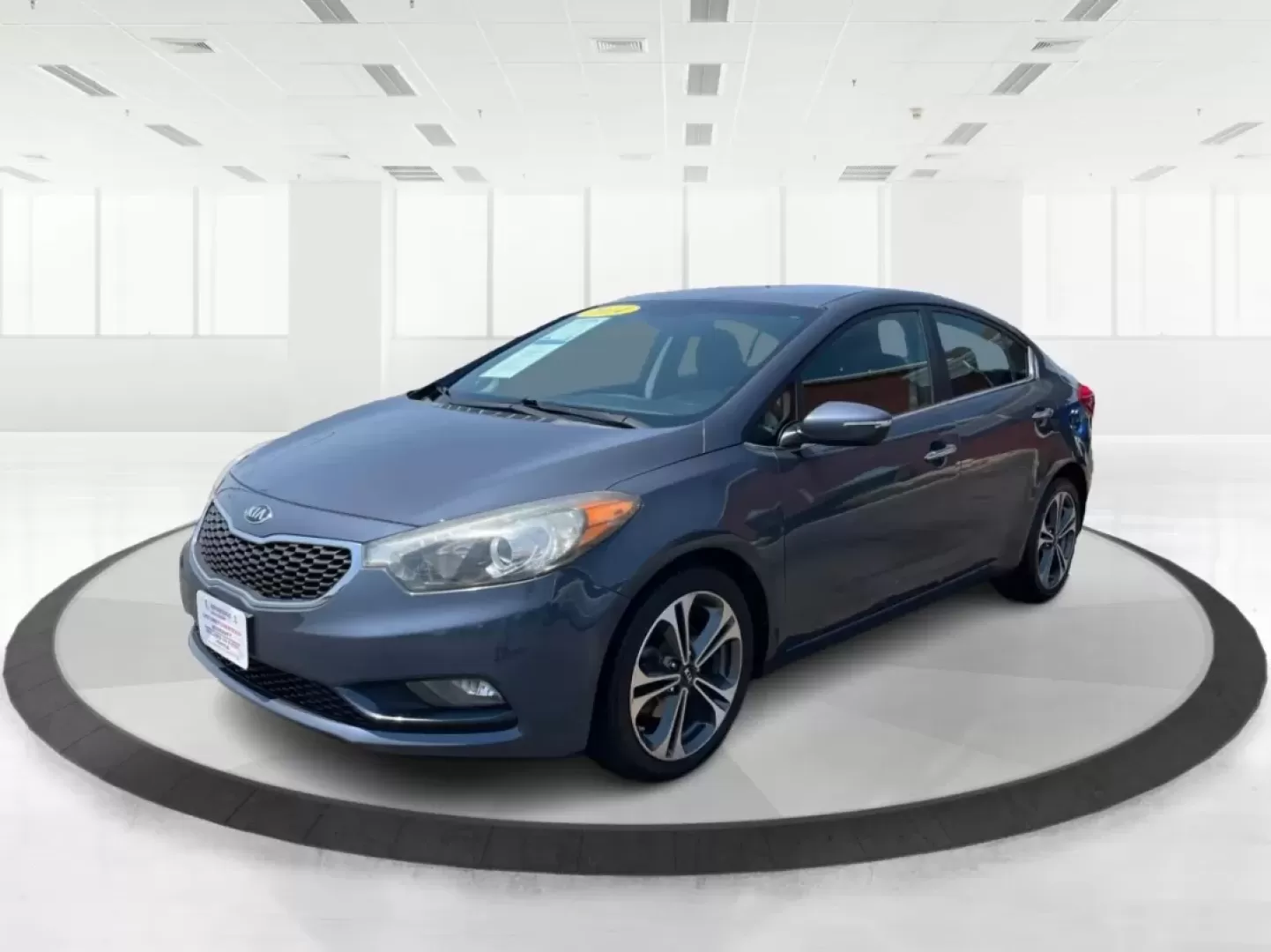 2014 Kia Forte EX (KNAFX4A88E5) with an 2L I-4 gasoline direct injection engine, located at 8750 N County Rd 25A, Piqua, OH, 45356, (937) 908-9800, 40.164391, -84.232513 - **Elevate Your Everyday Commute with the 2014 Kia Forte EX Perfect for the Modern Lifestyle**<br /> <br /> Looking for a reliable vehicle that effortlessly combines style, comfort, and affordability? The 2014 Kia Forte EX is the perfect choice for budget-conscious buyers and growing families alike. - Photo#8