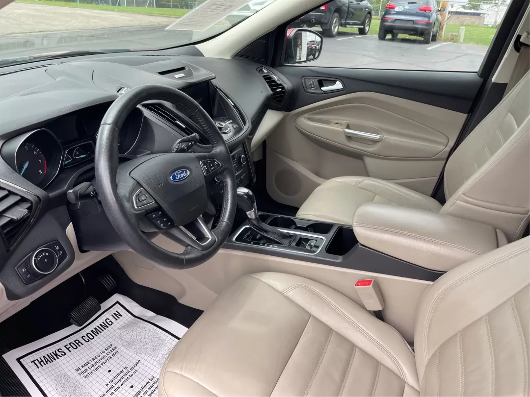 2017 Ford Escape Titanium (1FMCU0JD3HU) with an Other engine, located at 8750 N County Rd 25A, Piqua, OH, 45356, (937) 908-9800, 40.164391, -84.232513 - Photo#9