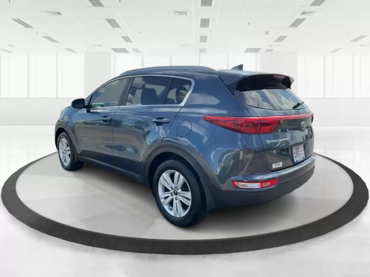 2017 Kia Sportage LX (KNDPM3ACXH7) with an Theta II 2.4L I-4 gasoline direct injection engine, located at 8750 N County Rd 25A, Piqua, OH, 45356, (937) 908-9800, 40.164391, -84.232513 - Photo#4