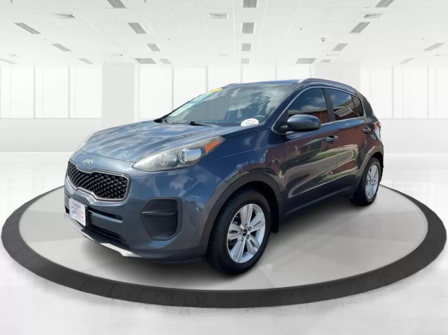 2017 Kia Sportage LX (KNDPM3ACXH7) with an Theta II 2.4L I-4 gasoline direct injection engine, located at 8750 N County Rd 25A, Piqua, OH, 45356, (937) 908-9800, 40.164391, -84.232513 - Photo#8