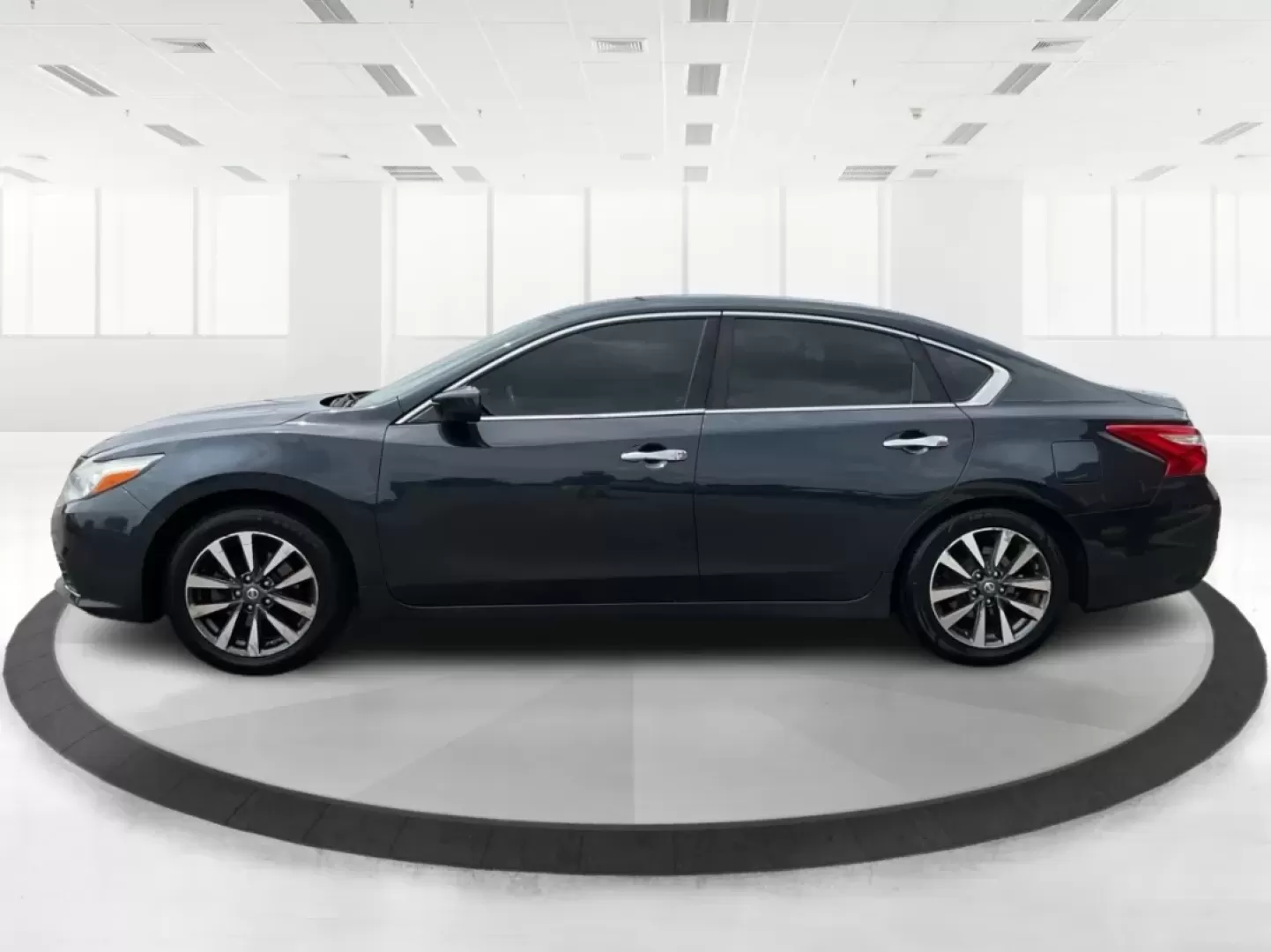 2017 Nissan Altima 2.5 SV (1N4AL3AP0HC) with an 2.5L L4 DOHC 16V engine, Continuously Variable Transmission transmission, located at 8750 N County Rd 25A, Piqua, OH, 45356, (937) 908-9800, 40.164391, -84.232513 - Unlock a seamless driving experience with the 2017 Nissan Altima 2.5 SV, a sedan designed not just for the daily commute but for life's countless adventures. Whether you're navigating the bustling streets of Fairborn, OH, or embarking on weekend getaways with the family, this Altima delivers a perfe - Photo#5