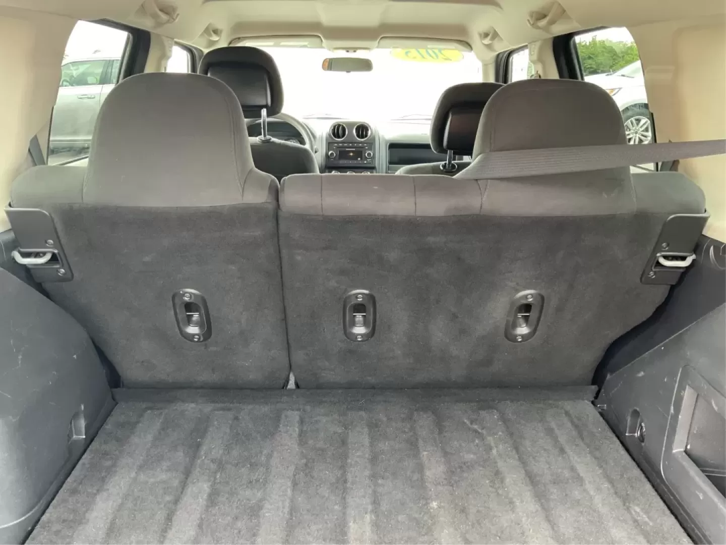 2015 Jeep Patriot Sport 2WD (1C4NJPBAXFD) with an 2.0L L4 DOHC 16V engine, located at 8750 N County Rd 25A, Piqua, OH, 45356, (937) 908-9800, 40.164391, -84.232513 - Explore the open road with confidence in this versatile 2015 Jeep Patriot Sport, available exclusively at Advantage Car and Credit, located at 1184 Kauffman Ave, Fairborn, OH 45324. Whether you're steering the family to soccer practice, heading out for a weekend adventure, or navigating your daily c - Photo#12